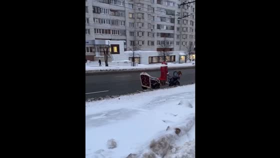 DIY sled with motoblock wandering the Russian streets with Z symbol