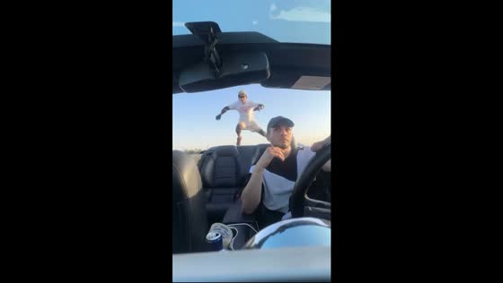 Man successfully lands stunt jump onto moving car in Rostov-on-Don, Russia