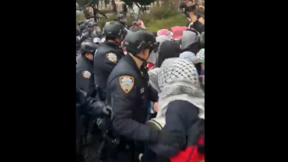 Police clash with protesters at Barnard College during bomb threat evacuation