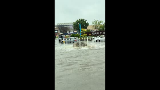 Severe flooded street with overflow water in Shanxi, China