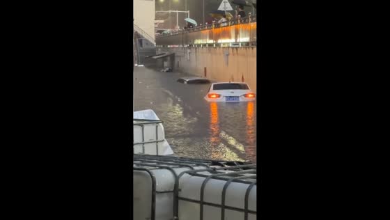 Flash flooding submerges vehicles at underpass in Jincheng, Shanxi, China