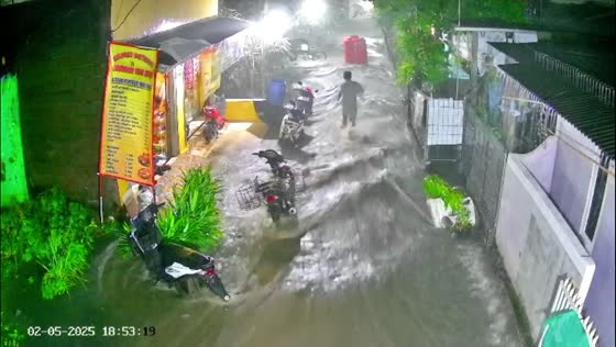Water tank swept by flood sparks chase in Cikarang, Indonesia