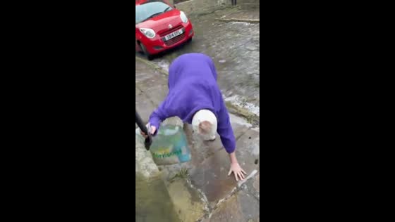 Ice-cold determination on an icy street in Halifax, West Yorkshire, UK