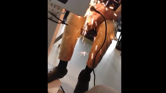 Person retreats after sparks fly while trying to cut live cable