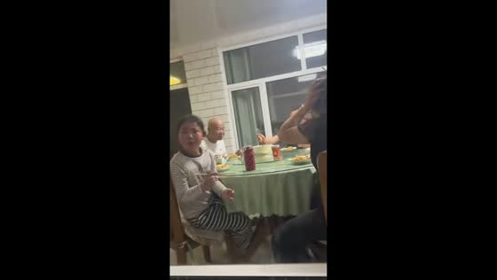 Woman startled after noticing camera in restaurant window in Tianjin, China