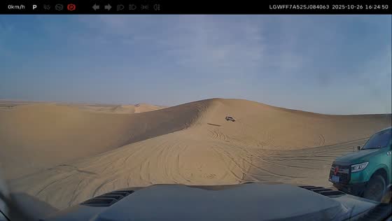Vehicle performs desert ramp jump in Xinjiang, China
