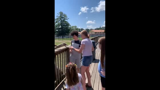 Ostrich surprises teenager during feeding at Timbavati Wildlife Park in Wisconsin Dells, USA