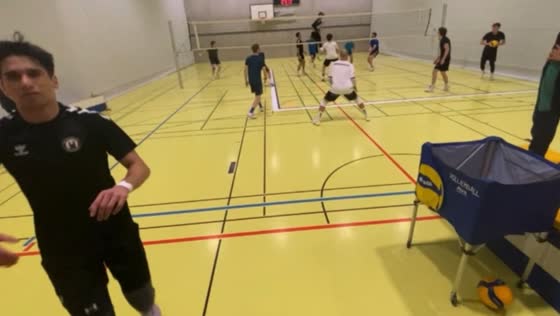 Volleyball player blocks shot with back in St. Gallen, Switzerland