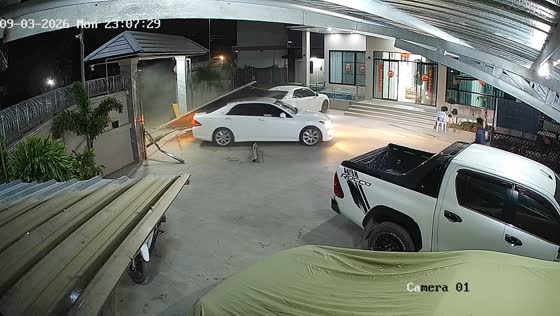 Car crashes into residential steel gate and drives away in Thailand