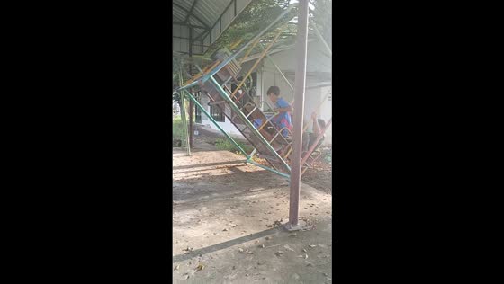 Teenagers flip swing set mishap in Bangkok, Thailand