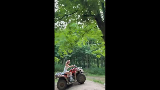 Woman falls off quad bike during muddy ride in Sichuan, China