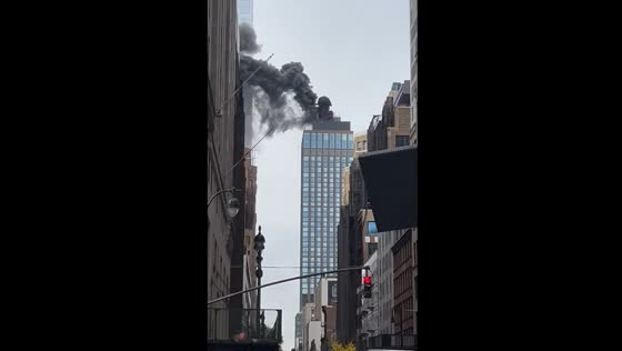 Fire breaks out on Midtown Manhattan skyscraper roof, smoke billows into air