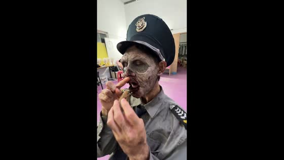 Zombie actor enjoys snack break in Zhejiang, China