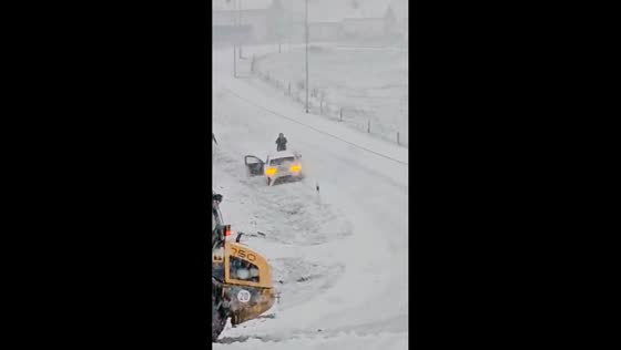 BMW slides into ditch during heavy snow in Germany