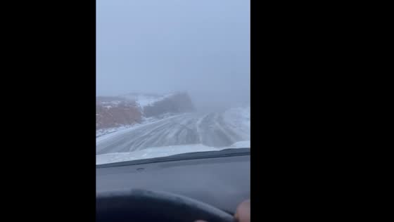 Snow and freezing fog covered the road in Saudi Arabia.