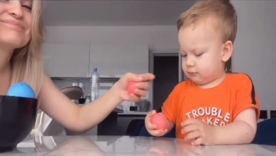 Easter egg fun with Arseniy: a toddler's joyful egg-tapping adventure