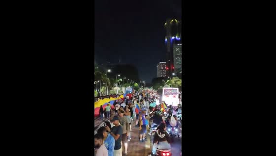Motorcade fills streets during baseball celebration in Avenida Bolívar, Caracas, Venezuela