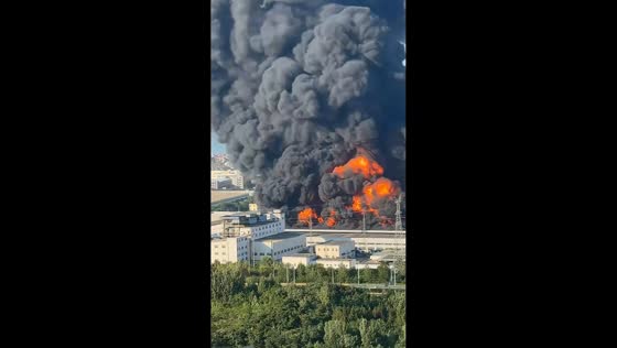Massive warehouse fire sends towering black smoke over in Qingdao, China