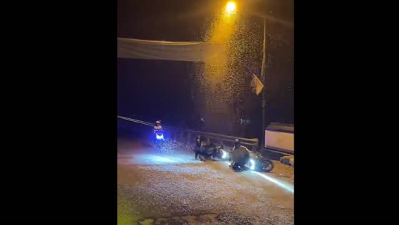 Motorcycles fall one after another because of flying termites in Purbalingga, Indonesia