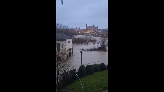 Guadalquivir River swells under heavy rain in Seville, Spain 