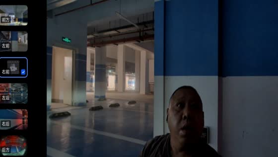 Driver startled after man suddenly sits up beside car in underground parking area in Hubei, China