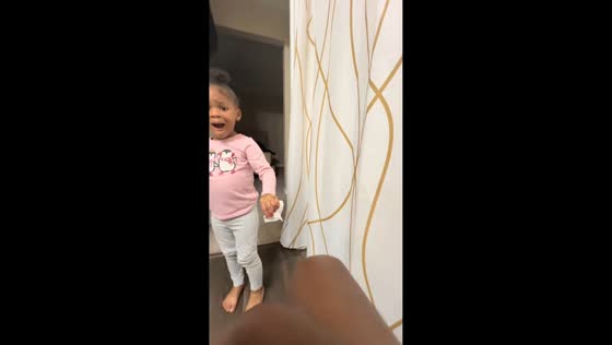Toddler reacts to playful toilet paper prank in Orlando, Florida, USA