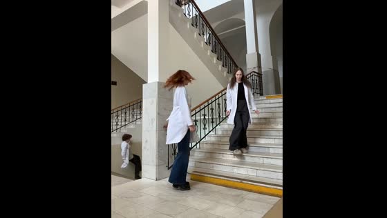 Boy falls down stairs in background of dance video in Ufa