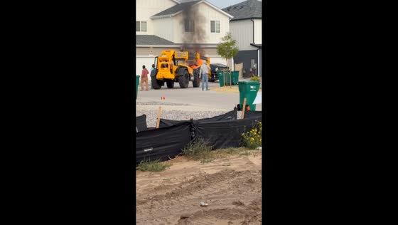Vehicle erupts in flames in residential driveway in Aurora, USA