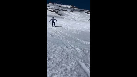 Fast descent skiing on the snowy slopes in Chamonix-Mont-Blanc, France