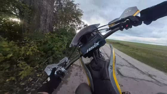Motorcyclist veers into bushes while attempting wheelie in Oleszyce, Poland