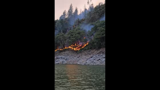 Thick wildfire smoke rises from Green Fire in Shasta Lake, California, USA