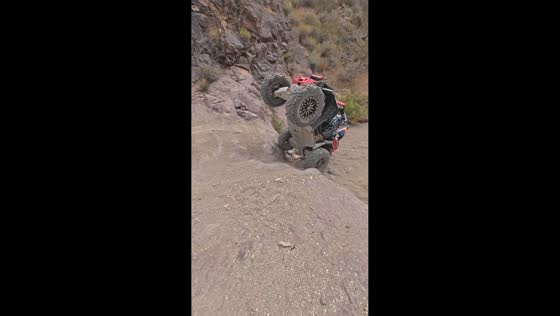 ATV rider falls after steep climb attempt at Secret Pass Canyon in Bullhead, Arizona, USA