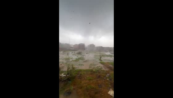 Tornado forms and moves across open area during heavy rain in Zhejiang, China