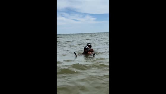 Hilarious underwater motorcycle illusion in Saquarema, Brazil