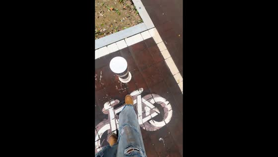 Man accidentally sits on wet bollard in Shanxi Province, China