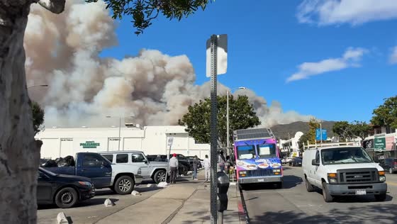 Visible smoke from growing wildfire in Pacific Palisades, California, USA