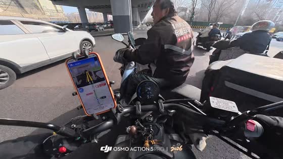 Motorcycle collision at intersection in Beijing, China