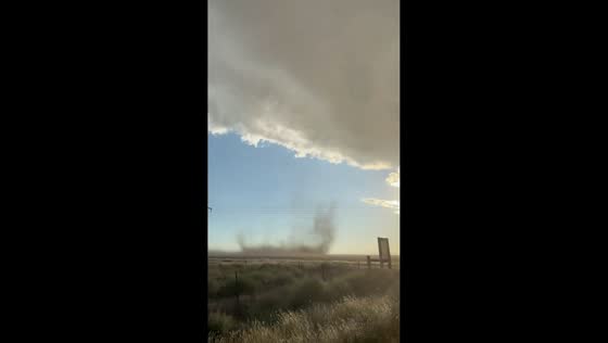Gustnado swirls across open plains as supercell brings giant hail to Eads, USA