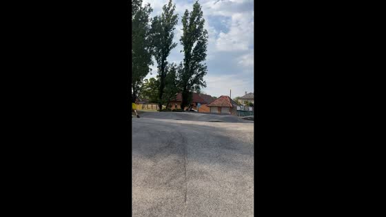 Scooter rider crashes after failed jump in Cegléd, Hungary
