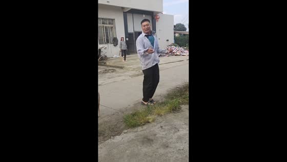 Man and dog perform playful moves together on street in Sichuan, China