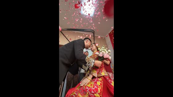Confetti popper causes ceiling light to fall during wedding photoshoot in Shanxi, China