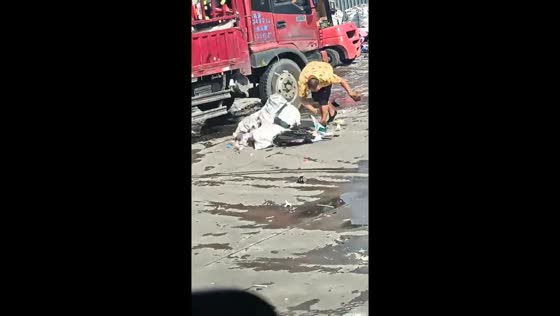 Debris falls from truck and hits man in Hebei, China