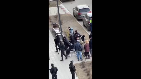 Moscow terror suspects brought to scene, one in wheelchair