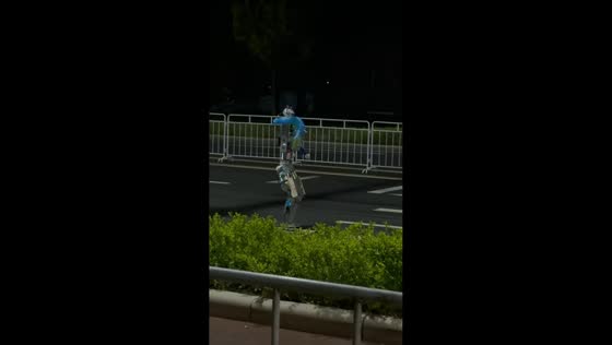 Robot malfunctions and emits sparks on roadside in Beijing, China