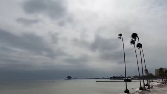 Dark storm clouds and gusty winds move across at Tampa Bay in St. Petersburg, Florida, USA