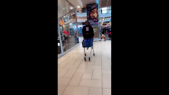 Girl falls while attempting to ride a shopping cart in Durban, South Africa