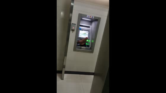 Chicken surprises ATM user in Guangdong, China