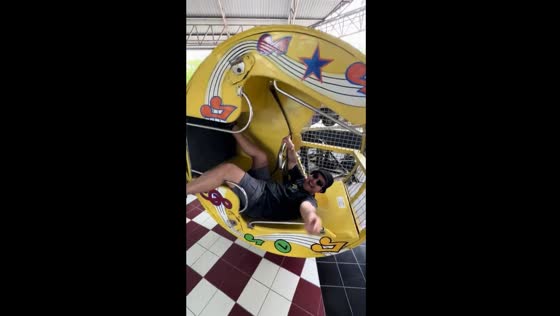 Thrilling ride at Dream World Amusement Park: hilarious screams and balancing act!