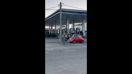 Vintage mini car spotted crossing avenue in Bahía Blanca, Argentina