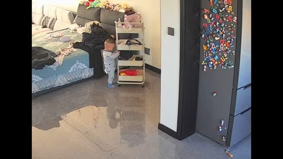 Curious child hits wall while wearing police hat in Liaoning, China